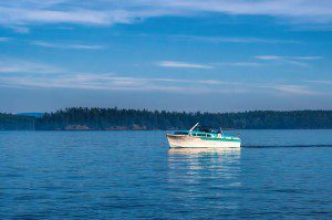 Vintage aqua and white boat.