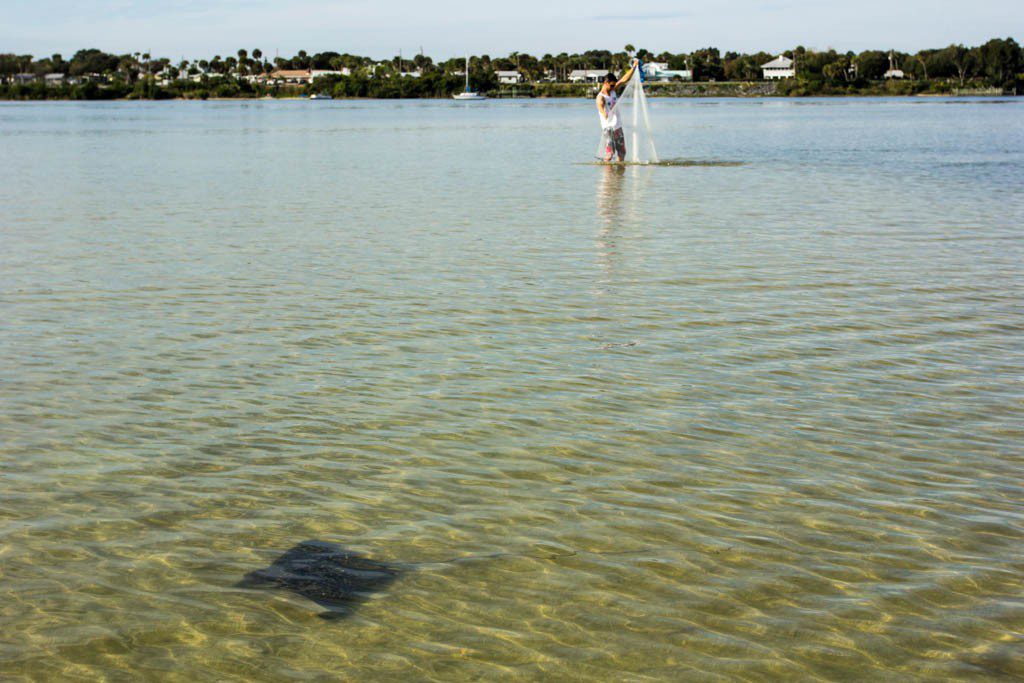 Ian with a spotted eagle ray in the foreground