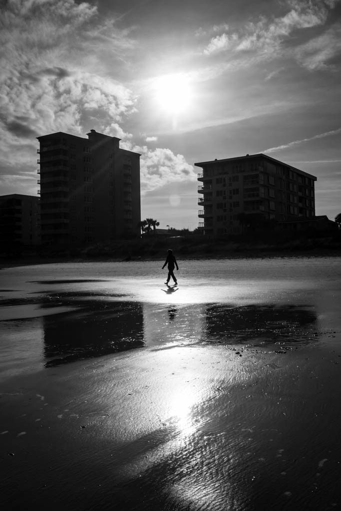 Another runner on the beach. Excellent lighting I think.