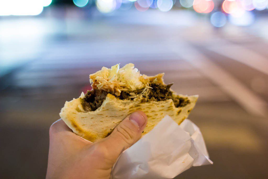 Meat sliced off a giant slab, Japanese shredded salad, sauce (I chose ketchup), all shoved into a pita.