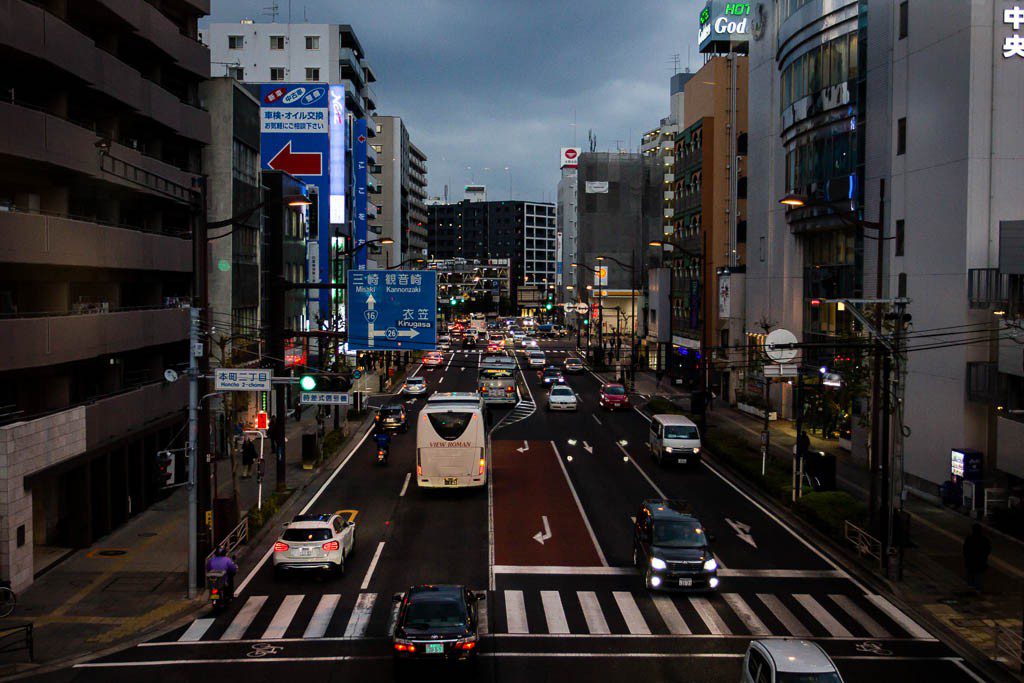 View down main street Yokosuka at dusk.