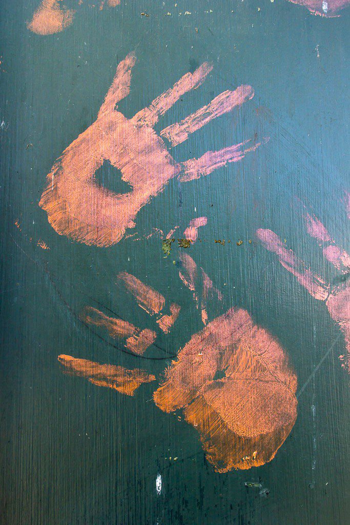 Handprints on the wall. it's art, not creepy, i swear!