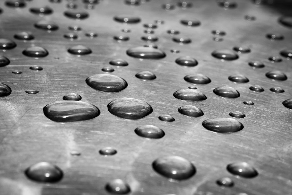 Water drops on the table outside the coffee place