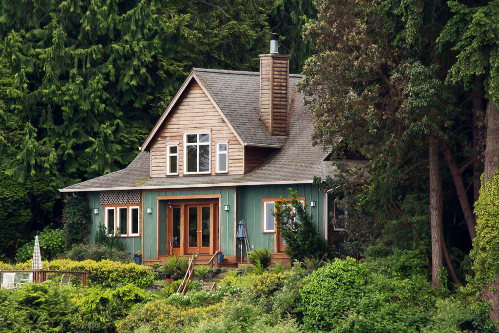 Craftsman detailing in a wooded setting. 