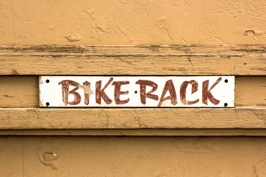 Hand lettered bike rack sign