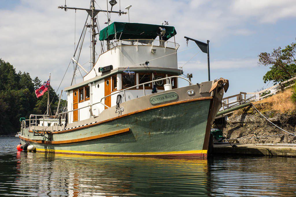 Beautiful old wooden boat on the way out. 