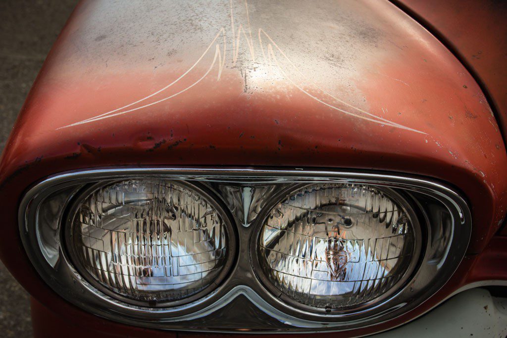 Patina, headlights, and pinstriping.