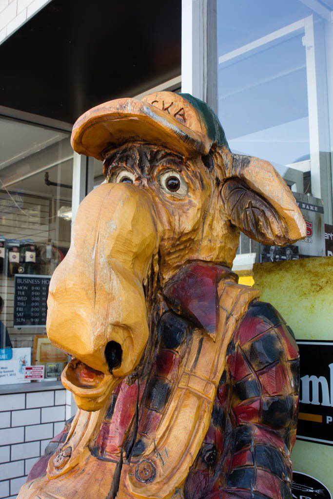 Wooden moose in flannel