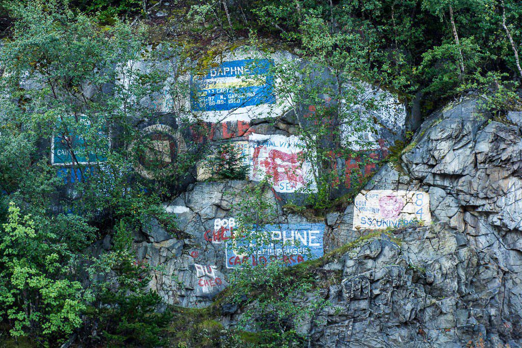 Getting off the ship, the cliff face is painted with the various ships and captains that have visited. I still want to know how they get up there. I'm sure there was a forklift involved. 