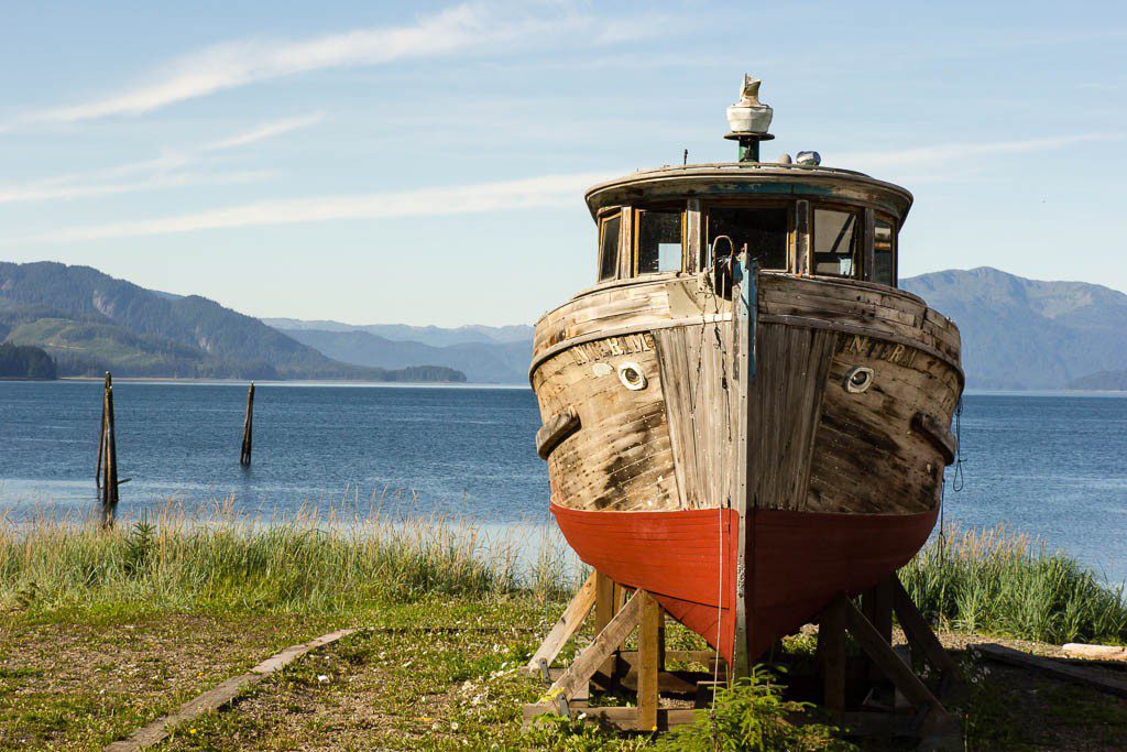 Old fishing boat. Don't know if they're fixing it up or leaving it there on block for aesthetic purposes.