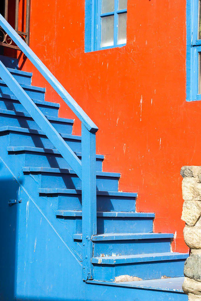 Orange and blue stairs of the Greek restaurant