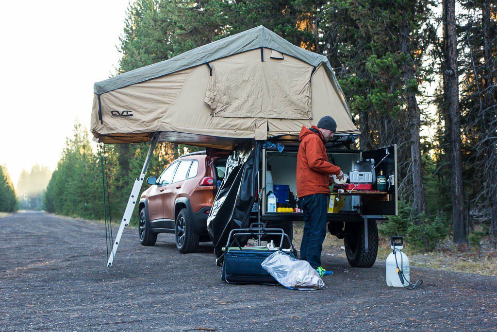 Here's our trailer with the tent unfolded and "kitchen" open for business.