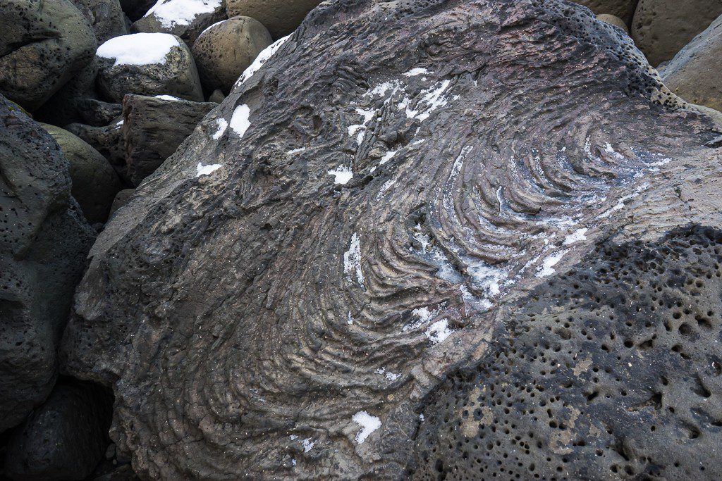 More fascinating lava flow. I don't generally think about molten rock in a place coated in ice...