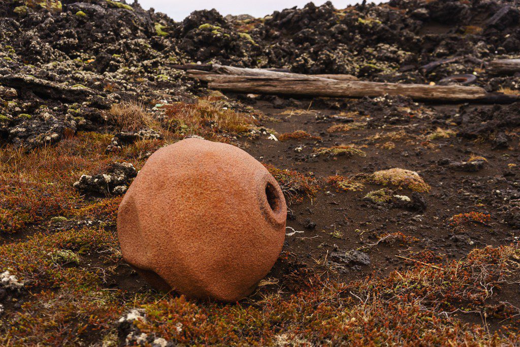 Another large metal object torn from its home and deposited on the beach by the waves.