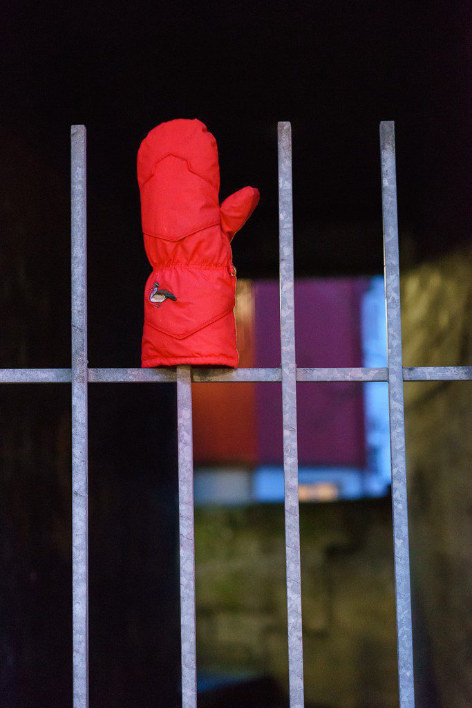 This is either a lost glove or the gate is waving hello.