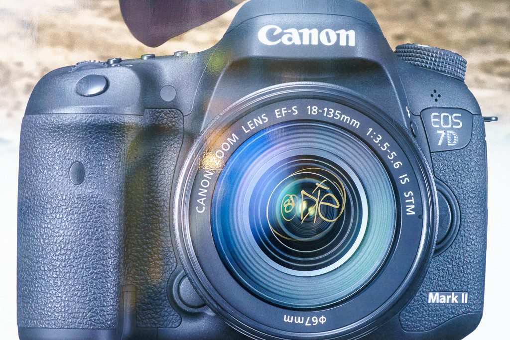 Picture of a Canon outside the camera store (that was never open) taken with a Sony. Oh, Irony...