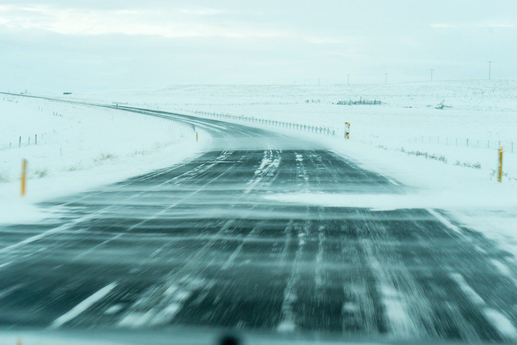 Yep, that's snow blowing across the highway. 