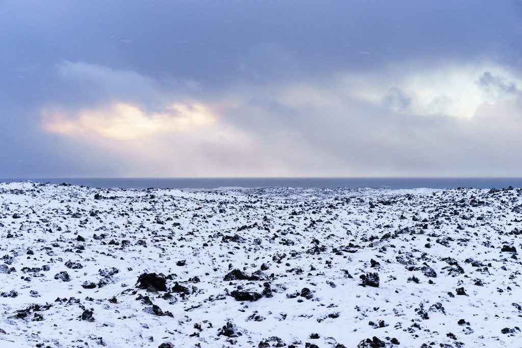 Rocky and snowy beach