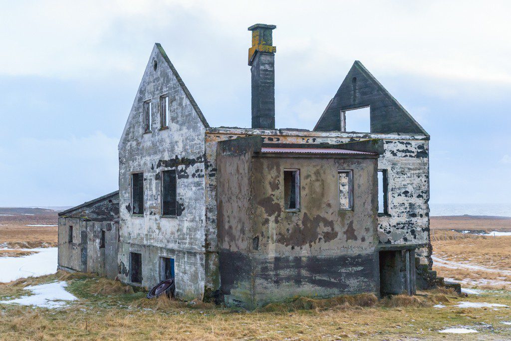 It amazes me that the chimney is still standing in the middle of the house.