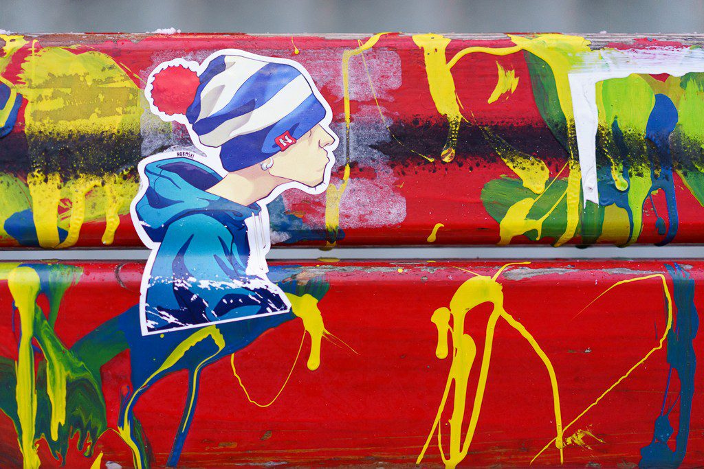 Random paint drips and a sticker.