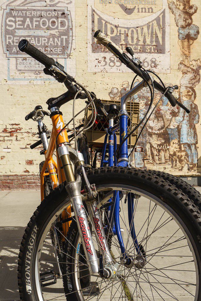 Bicycles. Like the contrast of old and new.  I don't like how I had to crop the bikes so much to get a usable shot. This is one I should have taken 3-4 more times until I got what it was I really wanted. 