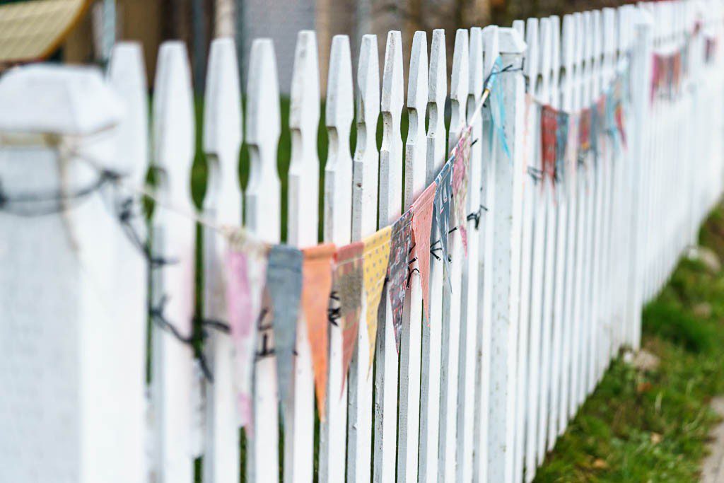 Flags on a fence