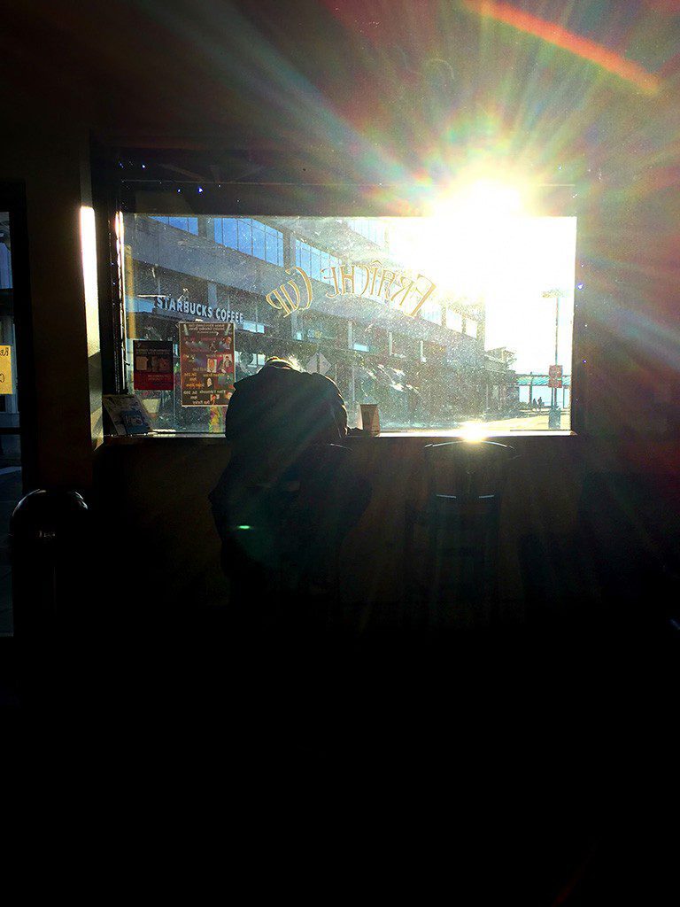 Sunrise through the window.  Coffee to keep you warm.