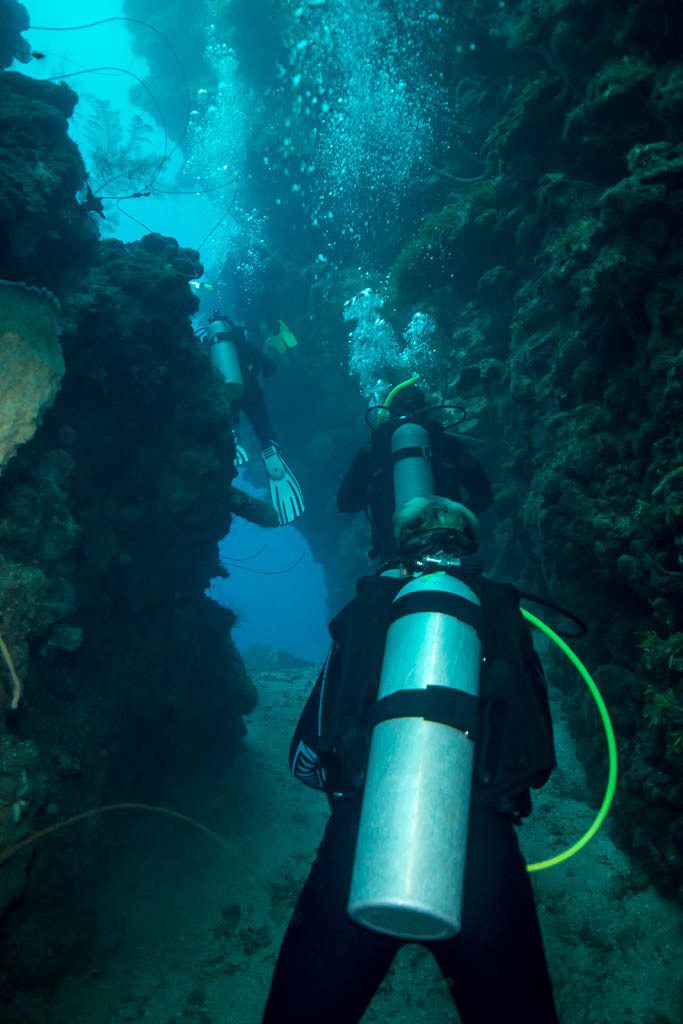 Jason had my camera through the crack since he's the better diver.  So that's me at the bottom!