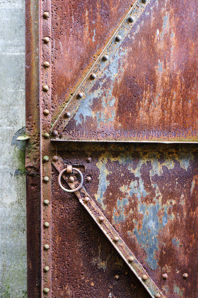 Rusty door and rivets